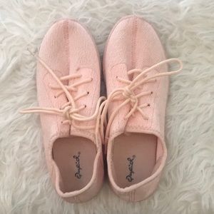 Lightly worn light pink sneakers